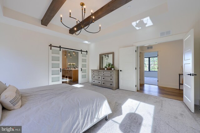 840 Wheatfield Ln, Lebanon, PA 17042 - carpeted bedroom featuring a barn door, beam ceiling, and an inviting chandelier