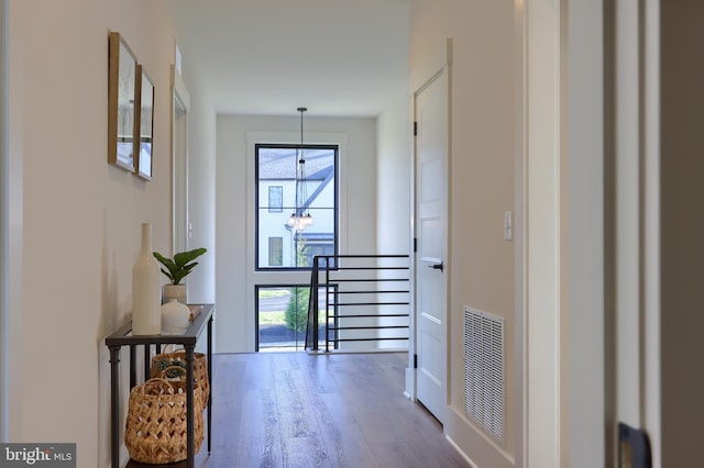 840 Wheatfield Ln, Lebanon, PA 17042 - hallway featuring light hardwood / wood-style floors and an inviting chandelier
