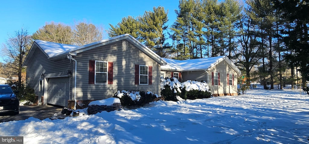 view of snow covered property