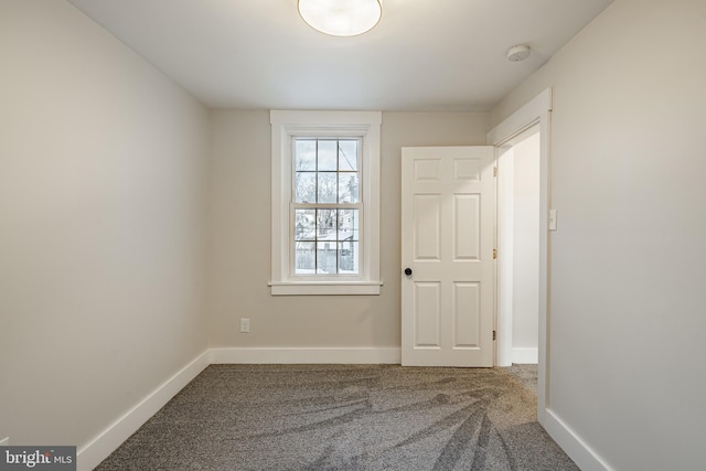 view of carpeted spare room