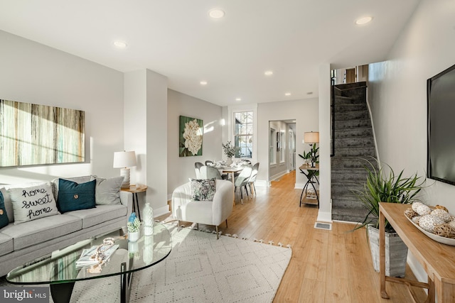 living room with light hardwood / wood-style floors