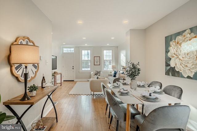 dining room with light hardwood / wood-style flooring