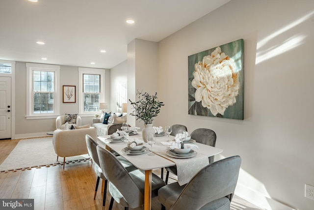 dining area with light hardwood / wood-style flooring