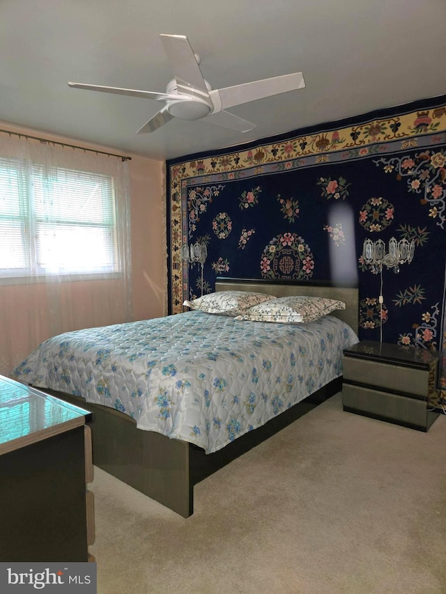 bedroom featuring carpet floors and ceiling fan