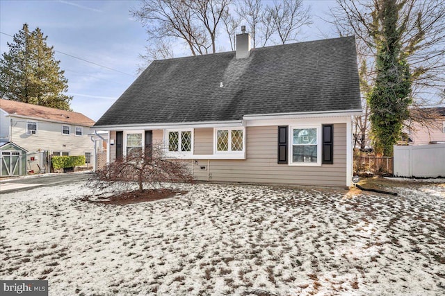 view of snow covered house