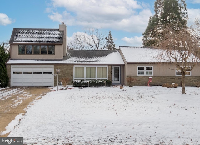 view of front of home with a garage