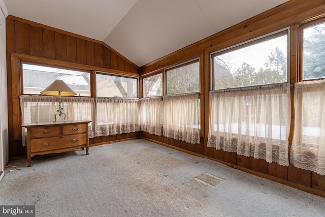 unfurnished sunroom with vaulted ceiling