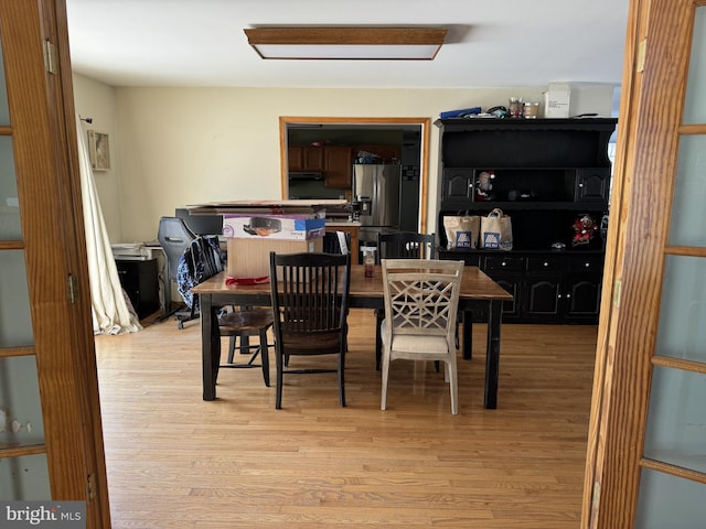 dining area featuring light hardwood / wood-style floors