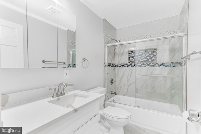 full bathroom featuring shower / bath combination with glass door, vanity, ornamental molding, and toilet