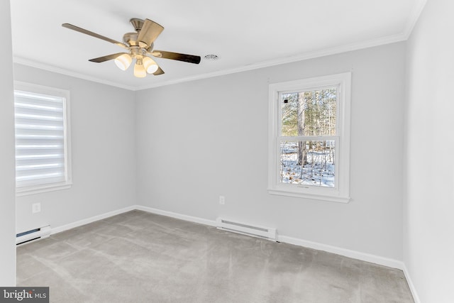 carpeted spare room with baseboard heating, crown molding, and ceiling fan