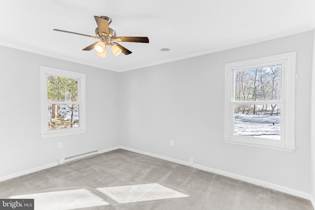 carpeted spare room featuring ceiling fan and a baseboard heating unit