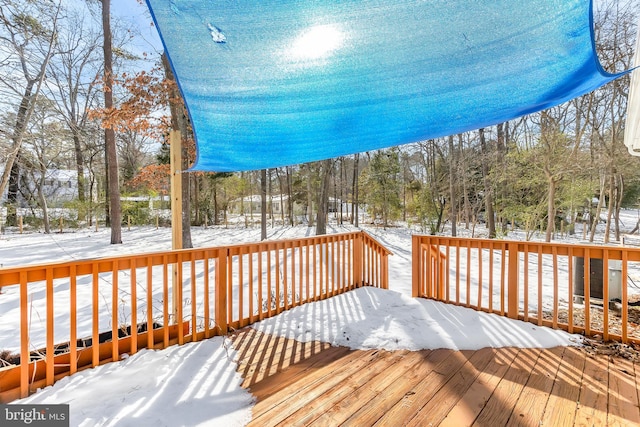 view of snow covered deck