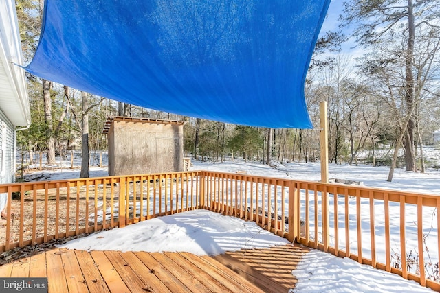 view of snow covered deck