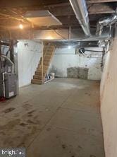 basement featuring heating unit