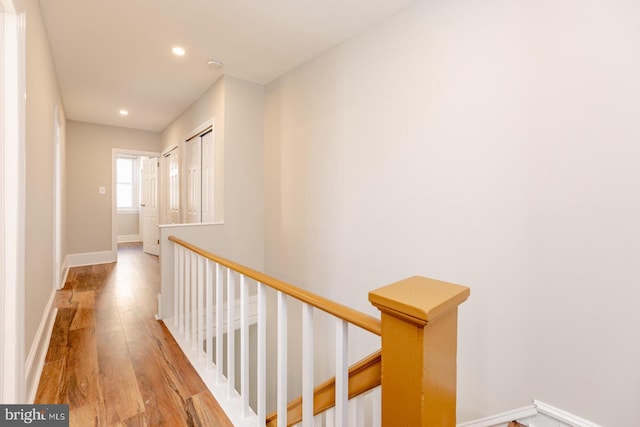2623 Sepviva St, Philadelphia, PA 19125 - hall with an upstairs landing, light wood-type flooring, recessed lighting, and baseboards