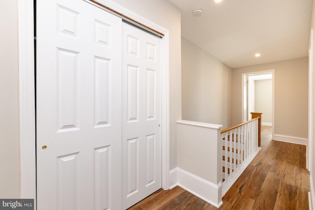 2623 Sepviva St, Philadelphia, PA 19125 - hallway with an upstairs landing, baseboards, wood finished floors, and recessed lighting