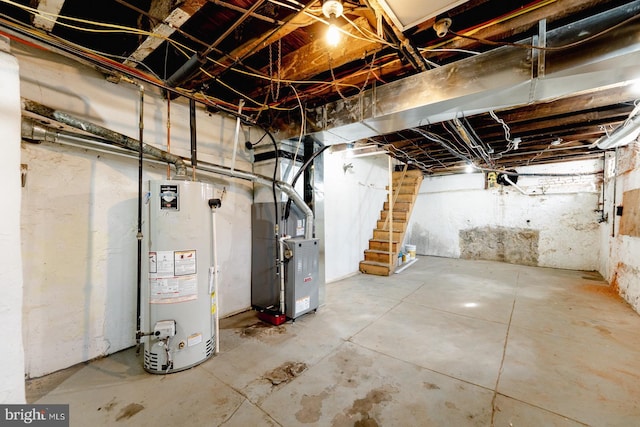 2623 Sepviva St, Philadelphia, PA 19125 - unfinished basement featuring gas water heater, heating unit, and stairway