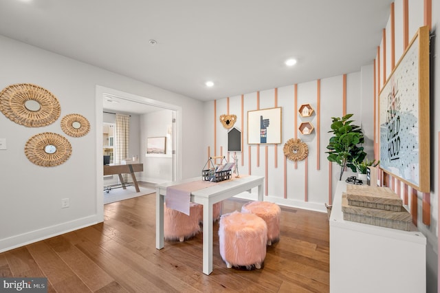 dining space featuring hardwood / wood-style flooring