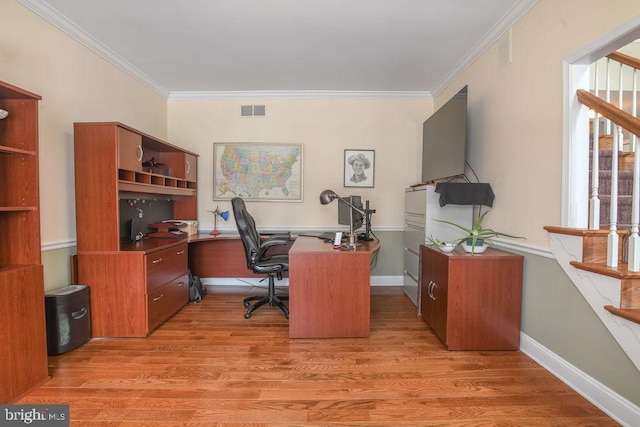 office featuring crown molding and light wood-type flooring