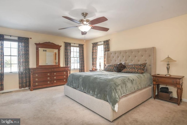 bedroom featuring ceiling fan and carpet floors