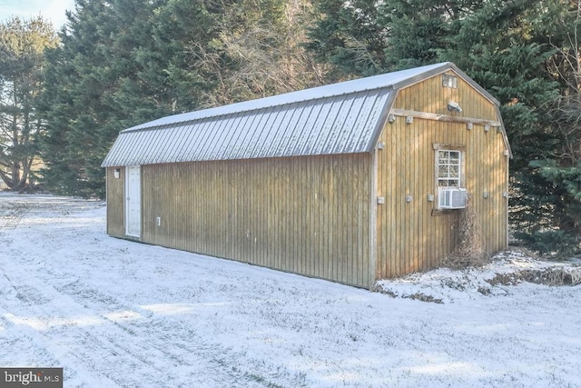 snow covered structure with cooling unit