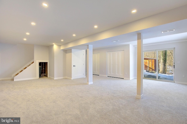 basement with light carpet