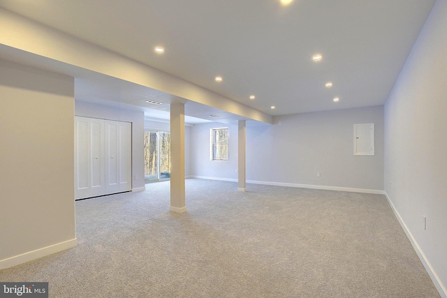 basement with light carpet