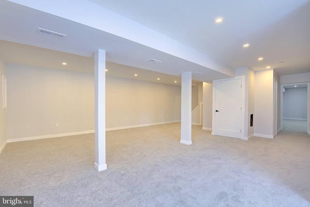 basement with light colored carpet