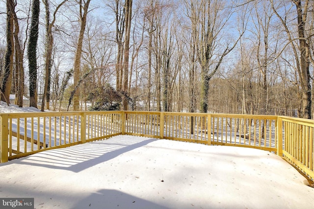 view of snow covered patio