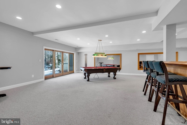 playroom with light carpet, indoor bar, and pool table