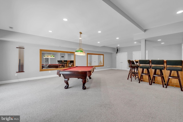 game room featuring pool table, indoor bar, and light colored carpet