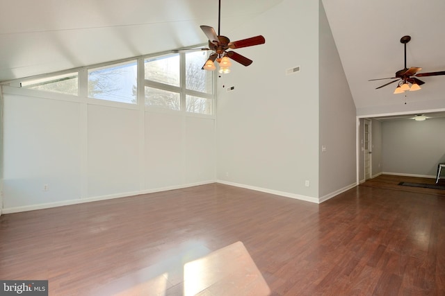 unfurnished living room featuring high vaulted ceiling, ceiling fan, and dark hardwood / wood-style floors