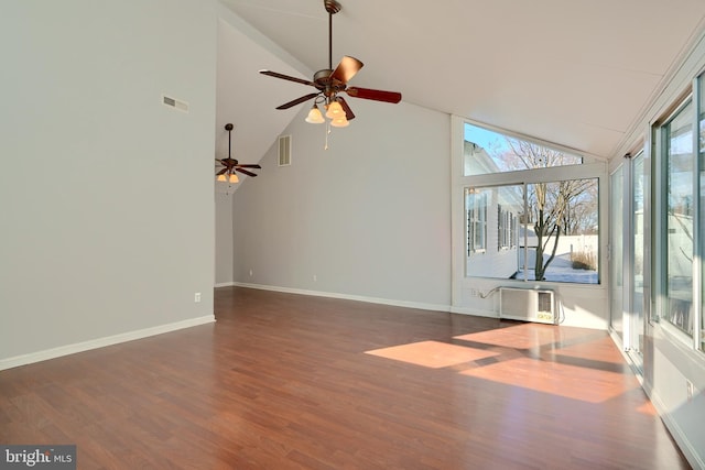 unfurnished living room featuring high vaulted ceiling, dark hardwood / wood-style flooring, ceiling fan, and a wall mounted AC