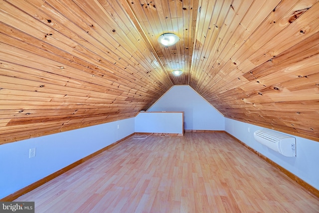 bonus room with a wall mounted AC, light wood-type flooring, wooden ceiling, and lofted ceiling