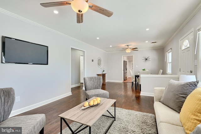 living room featuring ornamental molding and dark wood-type flooring