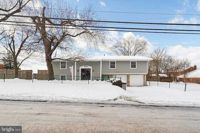 bi-level home featuring a garage