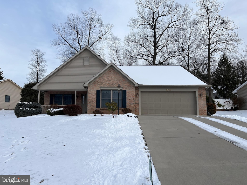 single story home featuring a garage