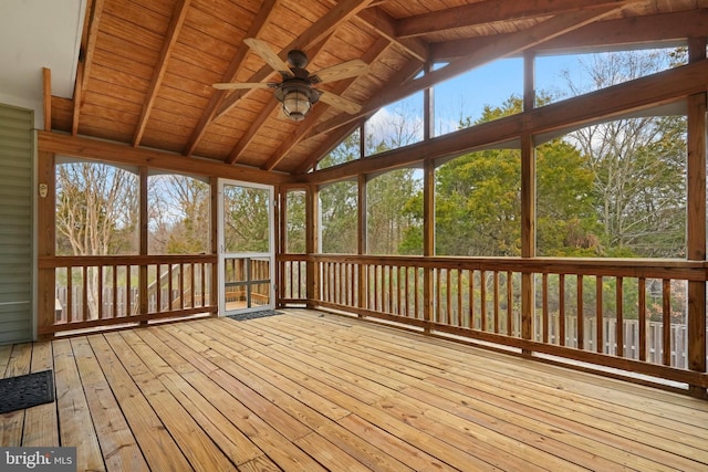 unfurnished sunroom with wood ceiling, ceiling fan, and lofted ceiling with beams