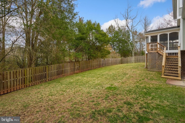 view of yard with a sunroom