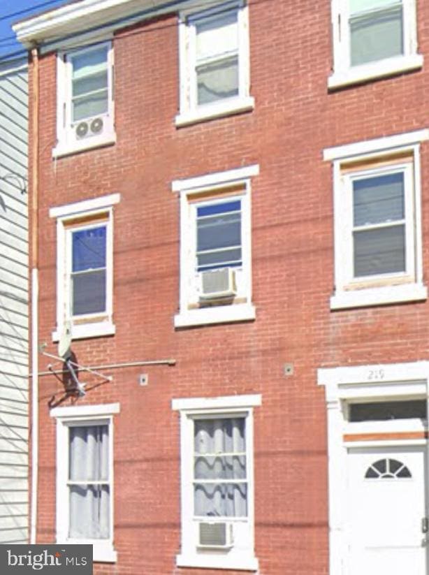 view of front of home featuring cooling unit