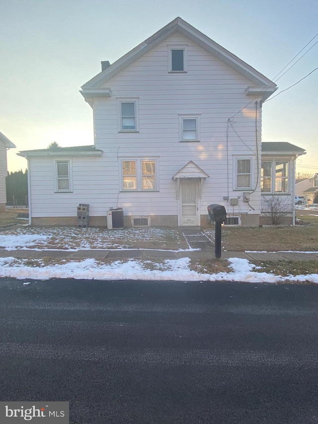 view of front of property with central AC