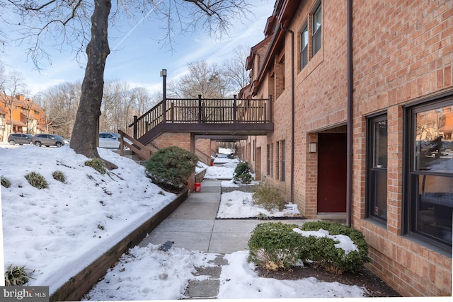 view of snow covered property