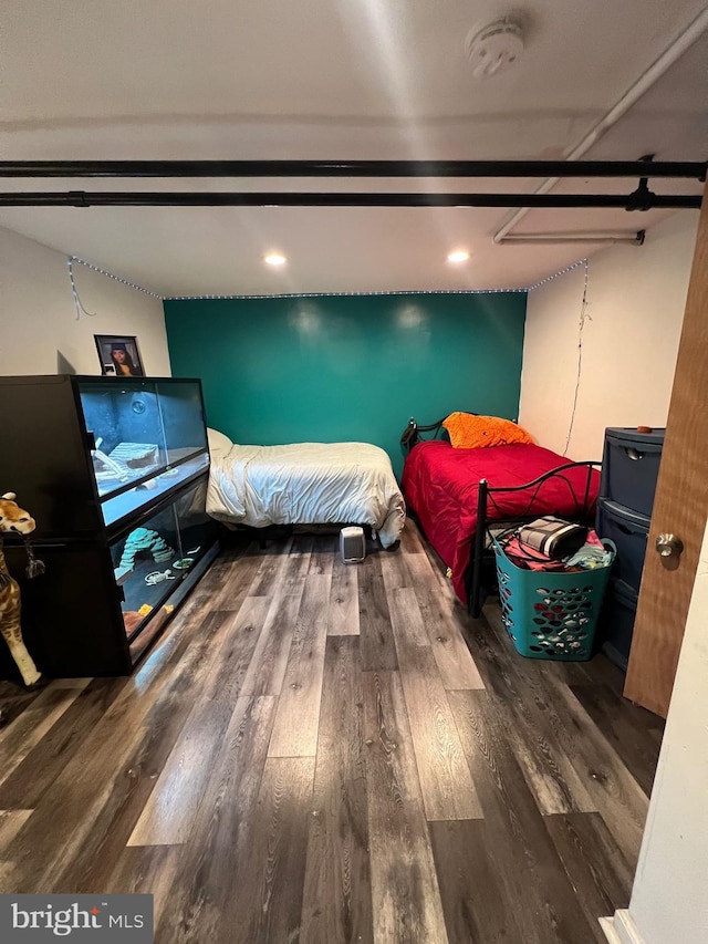 bedroom featuring hardwood / wood-style flooring