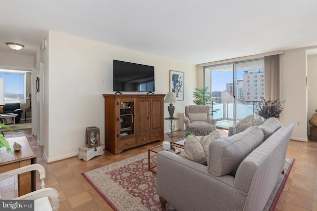 living room featuring plenty of natural light