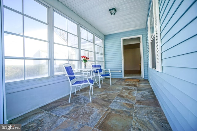 sunroom featuring plenty of natural light