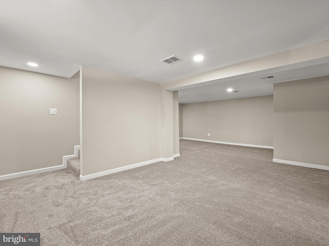 basement featuring carpet