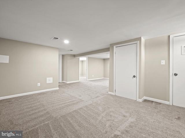 basement with light carpet