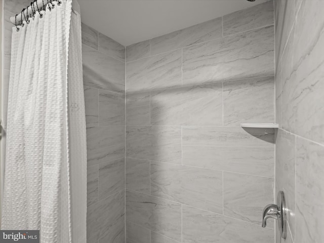 bathroom featuring walk in shower