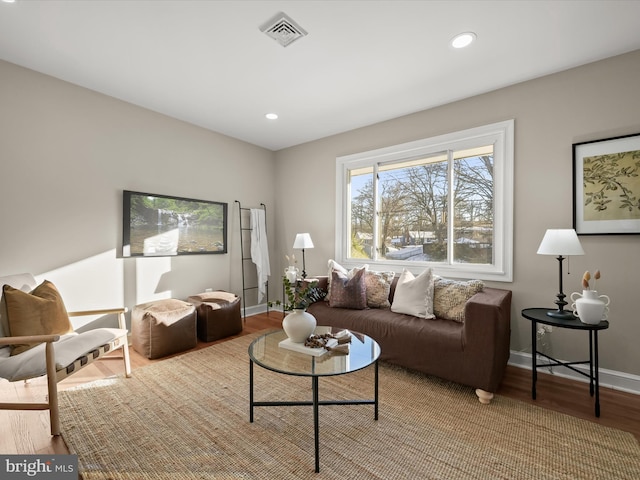 living room with light hardwood / wood-style floors