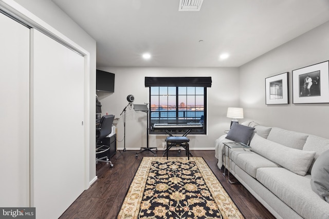 living room with dark wood-type flooring